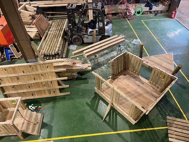 Boat being built 2 Workshop view of wooden boat playground equipment under construction, showcasing craftsmanship and quality.