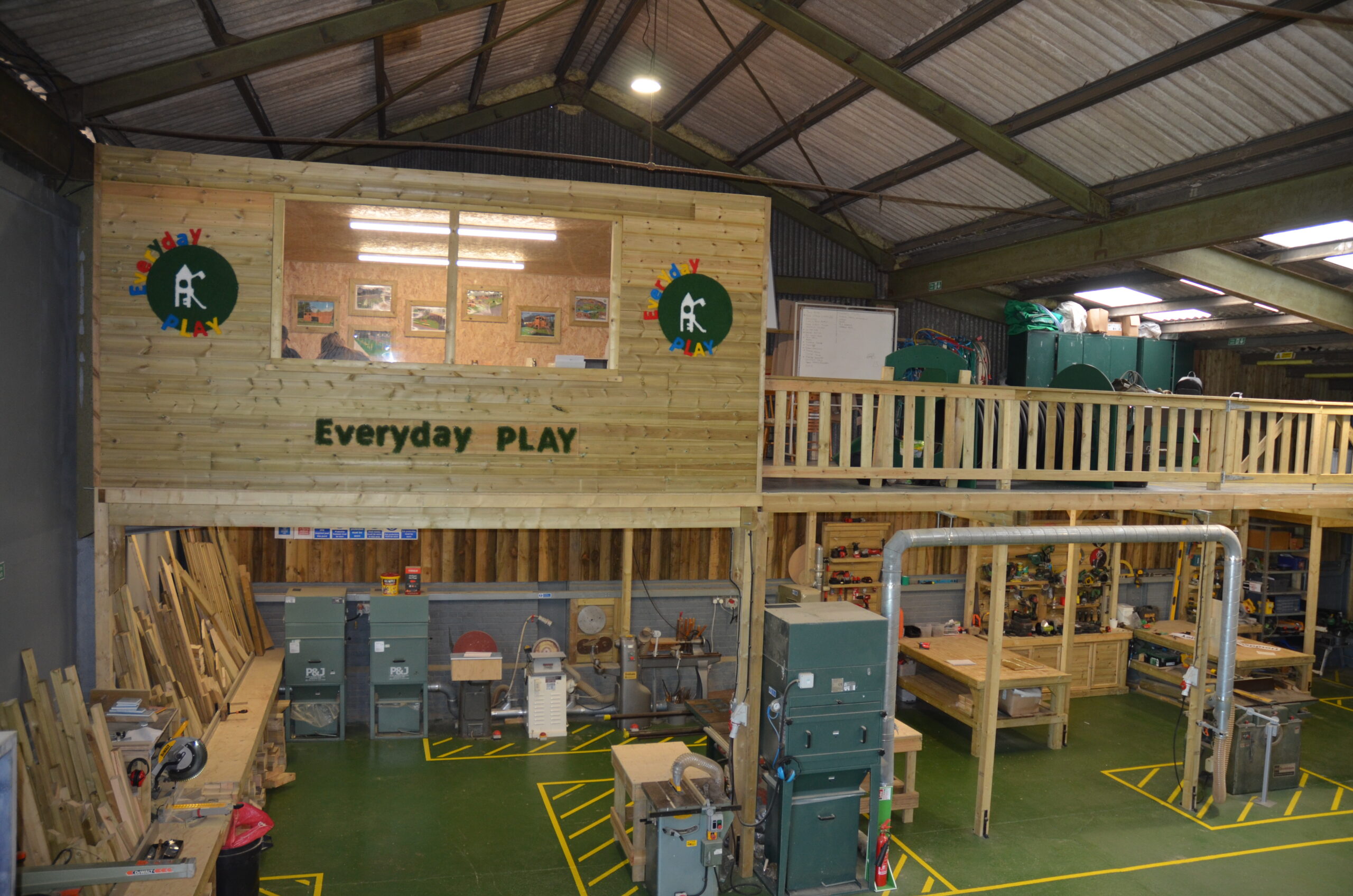 Playground equipment yard photo showing UK-built playground equipment in the workshop, ready for installation. Playground equipment yard photo showing UK-built playground equipment in the workshop, ready for installation.