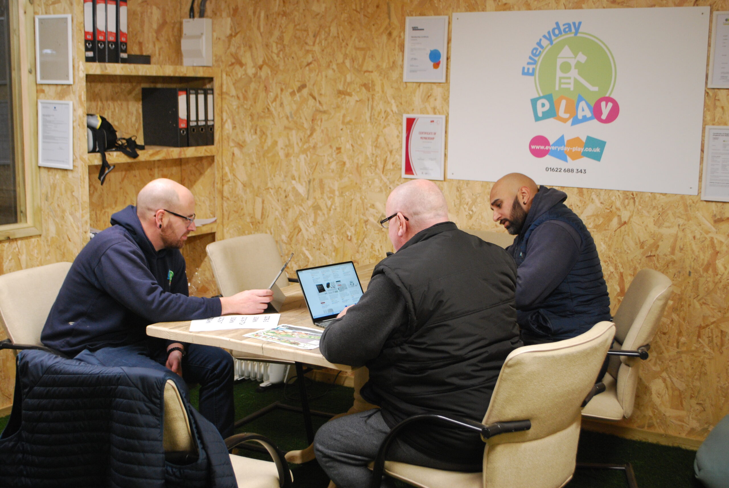 DSC_0124 Playground workshop meeting with three people discussing playground equipment in Kent
