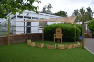 Sun Shade Sail over a Storytelling Chair at Allington Primary School