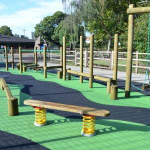 Barley Lane School Obstacle Course - Wooden Trim Trail by Everyday Play with green wetpour safety surface