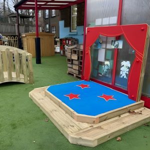 Star Stage for Schools and Nurseries in grounds of a school with artificial grass